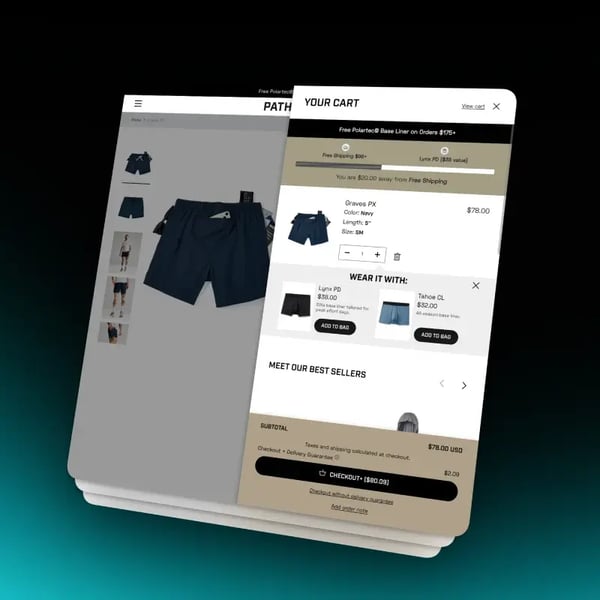 Shopify cart cross-sell page showing a Wear It With block recommending base liners for running shorts